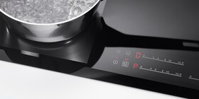 Start- og stop-knappen på Electrolux-induktionskomfur