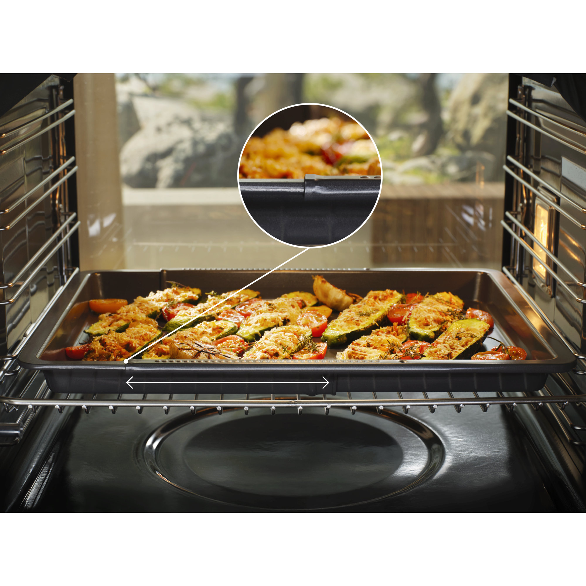 Extendable Easy2Clean Oven Tray adjusts to your cooking needs.