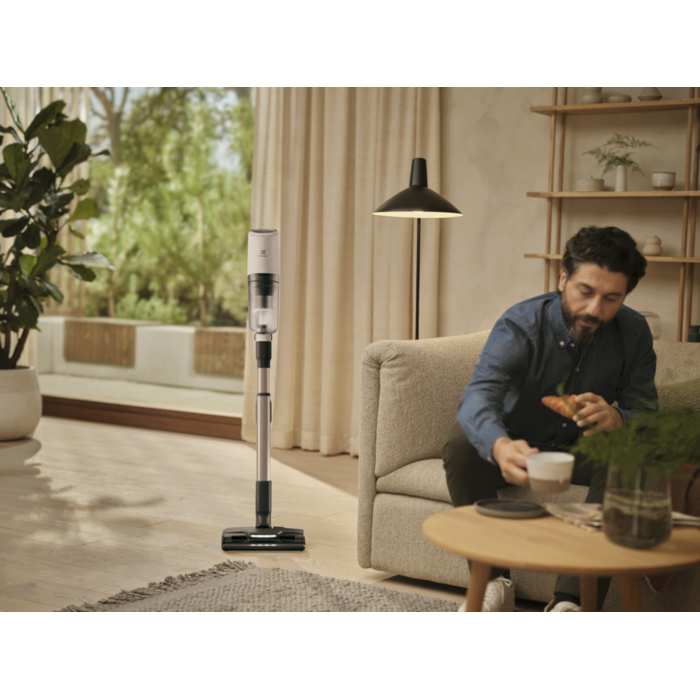 Vacuum cleaner in use in a home environment