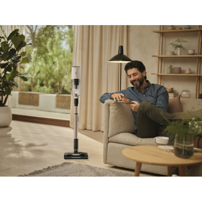 Vacuum cleaner in use in a home environment