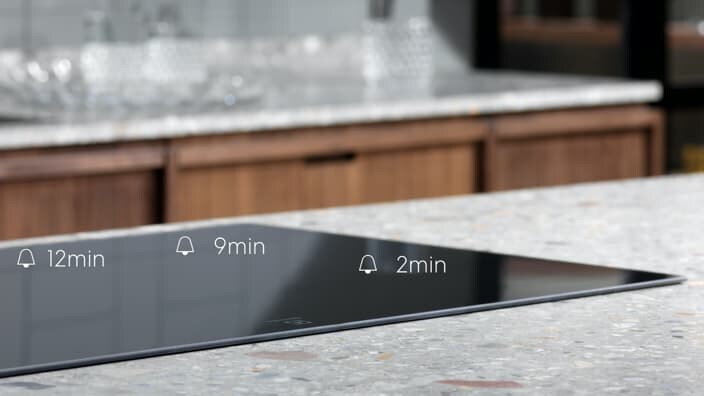 Kogeplader med individuel timer per zone