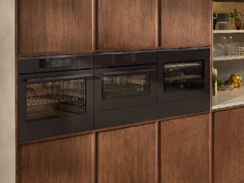 Ovens and wine cooler on a wall