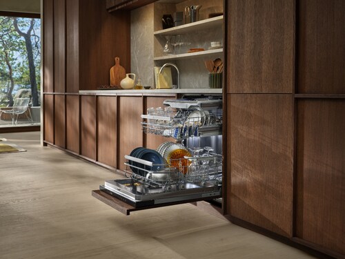 Opened dishwasher in a kitchen